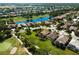 A golf course community with well-manicured lawns, lush landscaping, and beautiful ponds at 8771 52Nd E Ave, Bradenton, FL 34211