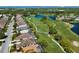 Community aerial showcasing golf course, water features and residences at 8771 52Nd E Ave, Bradenton, FL 34211