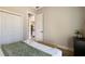 Neutral bedroom with a modern design, including closet space and a bright window view at 8771 52Nd E Ave, Bradenton, FL 34211