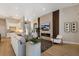 Comfortable living area showcasing a fireplace feature wall and modern furnishings at 8771 52Nd E Ave, Bradenton, FL 34211