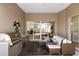 Outdoor patio features a built-in grill and a comfortable seating area at 8771 52Nd E Ave, Bradenton, FL 34211