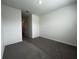 This bedroom offers neutral walls, carpeted flooring and ample natural light at 8864 Milestone Dr, Sarasota, FL 34238