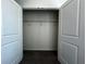 This walk-in closet has a wire shelving unit and offers ample storage space at 8864 Milestone Dr, Sarasota, FL 34238