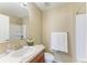 Well lit bathroom featuring a vanity with sink and drawers and a bathtub with shower at 8943 White Sage Loop, Lakewood Ranch, FL 34202