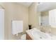 Cozy bathroom featuring a vanity with a sink, mirror, toilet, and shower with curtain rod at 8943 White Sage Loop, Lakewood Ranch, FL 34202