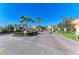 Well-maintained community entrance featuring lush landscaping, decorative elements, and secure access for residents at 8943 White Sage Loop, Lakewood Ranch, FL 34202