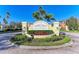 Willowbrook community entrance, boasting verdant landscaping, decorative hardscaping, and welcoming signage at 8943 White Sage Loop, Lakewood Ranch, FL 34202