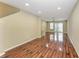 A large open living space with lots of natural light, hardwood floors, and access to upstairs at 8943 White Sage Loop, Lakewood Ranch, FL 34202