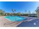Community pool with plenty of lounge seating, ideal for relaxing and soaking up the sun on a beautiful day at 8943 White Sage Loop, Lakewood Ranch, FL 34202