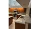 Bright kitchen with tile floor, granite countertops, stainless steel appliances, and lots of storage space at 9112 63Rd E Ct, Parrish, FL 34219