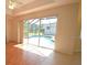 Open living area with view of screened-in pool and outdoor space at 9112 63Rd E Ct, Parrish, FL 34219