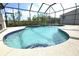Inviting screened-in pool with crystal clear water and spacious deck for outdoor enjoyment at 9112 63Rd E Ct, Parrish, FL 34219