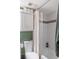 Cozy bathroom with tiled shower and a white vanity for storage at 3269 Beneva Rd # 102, Sarasota, FL 34232
