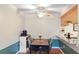 Bright dining area with stylish furniture adjacent to the kitchen, perfect for meals at 3269 Beneva Rd # 102, Sarasota, FL 34232