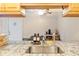 Kitchen sink with stainless steel fixtures and granite countertops at 3269 Beneva Rd # 102, Sarasota, FL 34232