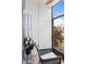 Relaxing patio area with chairs and lovely garden view at 3269 Beneva Rd # 102, Sarasota, FL 34232
