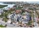 Sweeping aerial view of new construction homes in a coastal community with lush landscaping and water views at 114 Fillmore Dr, Sarasota, FL 34236