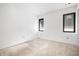 Bedroom view shows bright white walls, flooring, and new windows that provide ample natural light at 114 Fillmore Dr, Sarasota, FL 34236