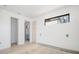 Bright hallway with doors leading to other rooms in the house with new windows installed at 114 Fillmore Dr, Sarasota, FL 34236