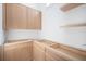 Newly-installed wood cabinets with custom hardware, offering ample storage solutions for the kitchen at 114 Fillmore Dr, Sarasota, FL 34236