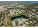 Beautiful aerial view highlighting the property nestled between lakes and mature landscaping at 1310 91St Nw Ct, Bradenton, FL 34209