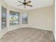 Bright bedroom with carpet and lots of natural light from multiple windows providing scenic views at 1310 91St Nw Ct, Bradenton, FL 34209