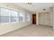 Large bedroom with a closet and natural light from the three windows at 1310 91St Nw Ct, Bradenton, FL 34209