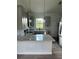 Close up of the modern kitchen featuring gray cabinets, granite countertops, and stainless steel appliances at 14343 Myakka Ave, Port Charlotte, FL 33953