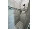 Close up of the shower featuring gray tile walls and floor at 14343 Myakka Ave, Port Charlotte, FL 33953