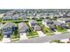 Aerial view of the property highlighting its prime location within a community near a lake at 16119 Paynes Mill Dr, Bradenton, FL 34211