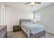 Bedroom with ample light, ceiling fan and wall to wall carpet at 16119 Paynes Mill Dr, Bradenton, FL 34211