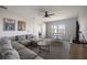 Bonus room featuring a sofa, TV, and a table with chairs near a bright window at 16119 Paynes Mill Dr, Bradenton, FL 34211