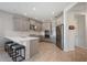 Bright kitchen with gray cabinetry, stainless steel appliances, a spacious island, and sleek countertops at 16119 Paynes Mill Dr, Bradenton, FL 34211