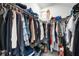 Spacious walk-in closet with ample hanging space and shelving for organization at 16119 Paynes Mill Dr, Bradenton, FL 34211