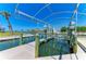 Scenic boat lift view for convenient waterfront access and boat storage in a picturesque setting at 1918 Massachusetts Ave, Englewood, FL 34224