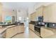 Modern kitchen with updated appliances, tile flooring, and plenty of counter space at 1918 Massachusetts Ave, Englewood, FL 34224