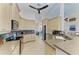Open kitchen featuring granite countertops, stainless steel appliances, and ample cabinet space at 1918 Massachusetts Ave, Englewood, FL 34224