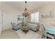 Cozy living room area, great seating, and a unique chandelier at 1918 Massachusetts Ave, Englewood, FL 34224