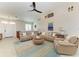 Comfortable sectional sofa in a well-lit living room at 1918 Massachusetts Ave, Englewood, FL 34224