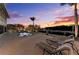 Resort-style pool with in-pool loungers and waterfront views, perfect for outdoor entertaining at 1918 Massachusetts Ave, Englewood, FL 34224