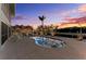 Backyard pool oasis with in-pool loungers and tropical landscaping, great for relaxation at 1918 Massachusetts Ave, Englewood, FL 34224