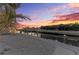 Waterfront property featuring private dock and picturesque canal views at 1918 Massachusetts Ave, Englewood, FL 34224