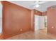 Spacious bedroom with ceiling fan and an ensuite bathroom at 2103 L Pavia Blvd # 2103, Venice, FL 34292