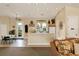 Well-lit kitchen and casual dining area with tile floors and easy access to the outside at 2103 L Pavia Blvd # 2103, Venice, FL 34292