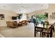 Bright and spacious living room with comfortable seating and access to outdoor area at 2103 L Pavia Blvd # 2103, Venice, FL 34292