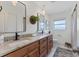Bathroom featuring double sinks, granite countertop and decor at 2111 Ivory Pl, Sarasota, FL 34239