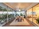 Screened lanai featuring a dining table, creating a perfect space for outdoor dining and relaxation at 2111 Ivory Pl, Sarasota, FL 34239