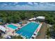 Aerial view of a recreational pool area, including a large main pool and adjacent smaller pool at 2111 Ivory Pl, Sarasota, FL 34239