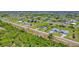 Panoramic aerial view of a residential community with lush landscaping and well-maintained streets at 217 Rotonda S Blvd, Rotonda West, FL 33947