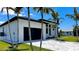 The garage is spacious and attached to the house with a nice driveway at 217 Rotonda S Blvd, Rotonda West, FL 33947